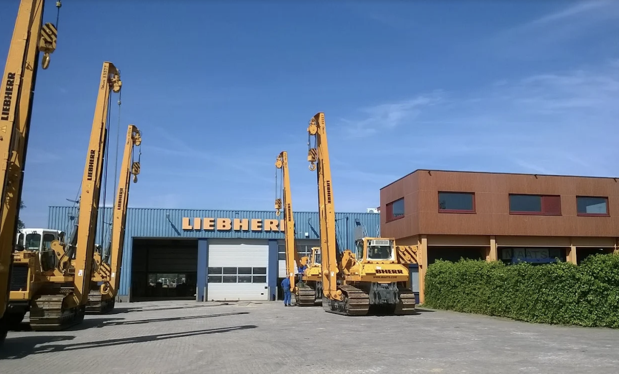 MAATS Liebherr pipelayers lined up outside workshop facility.