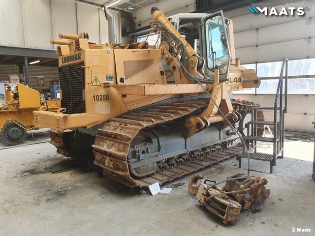 Liebherr RL44 pipelayer undergoing maintenance inside MAATS workshop.